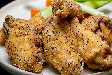 Lemon and Black Pepper Chicken Wings cooked for wing delivery near Barclay-Kingston, Cherry Hill, NJ.