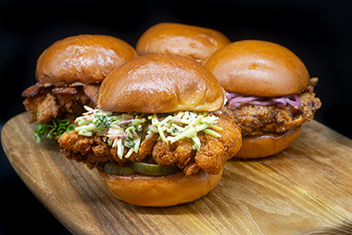 Four Fried Chicken Sandwiches prepped for Cherry Hill chicken wings delivery.